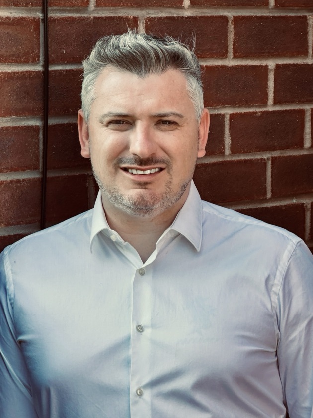 Chris Davies — Principal Consultant, AxionAI.club